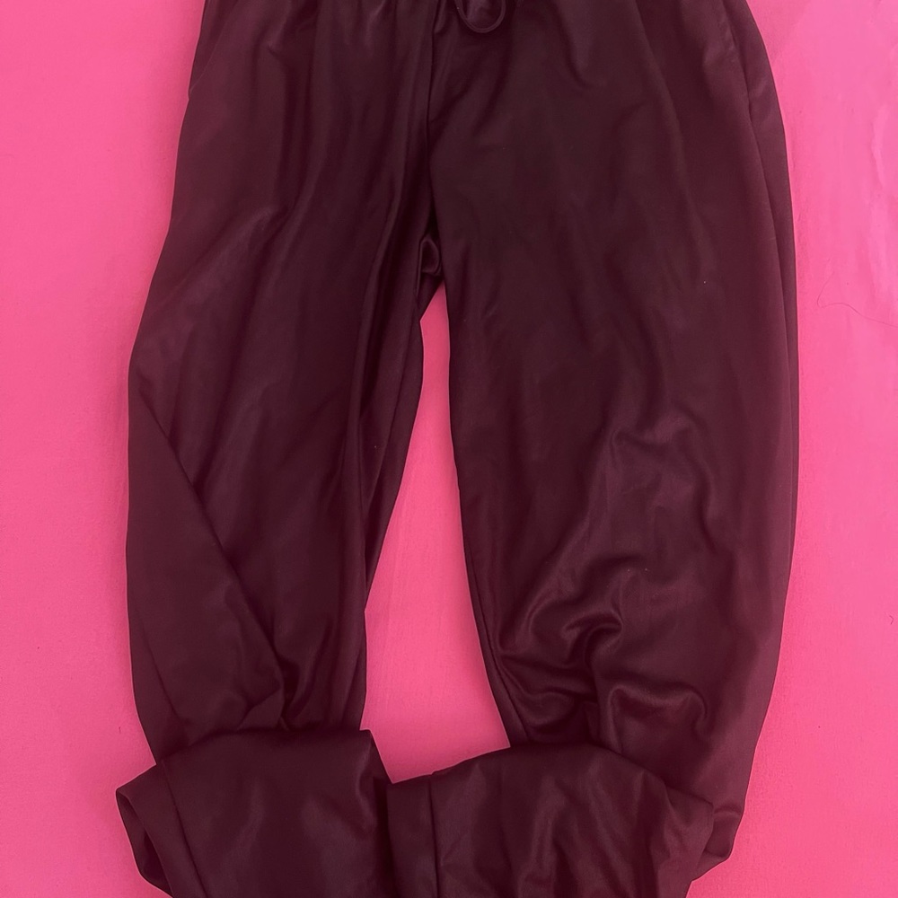 Fashion nova, leather joggers black size small.